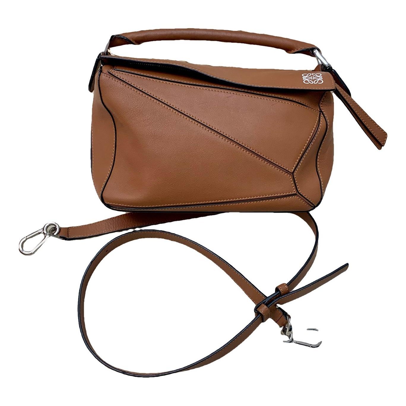 Puzzle leather handbag