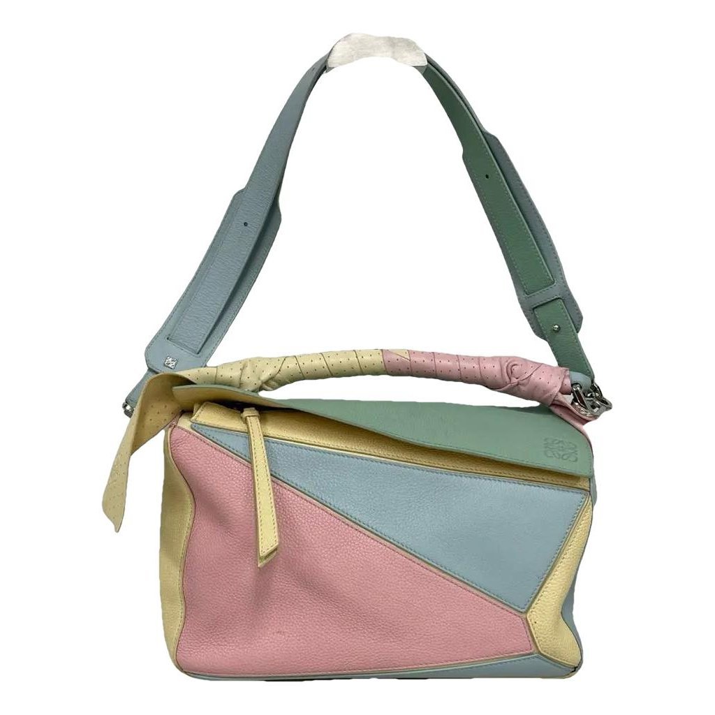 Puzzle leather handbag