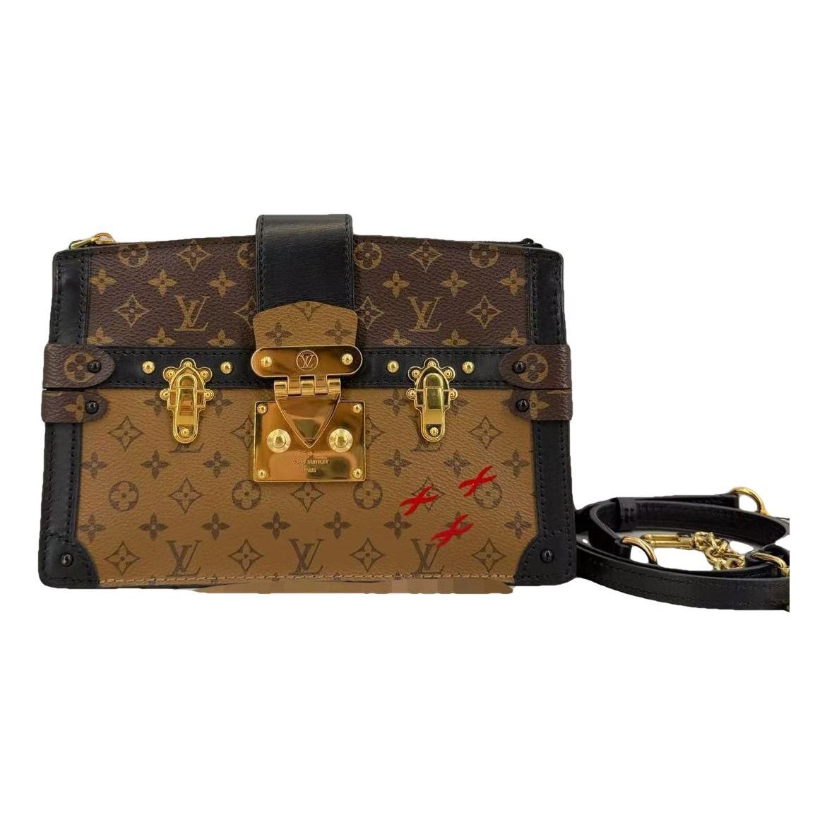 Pochette Trunk leather handbag