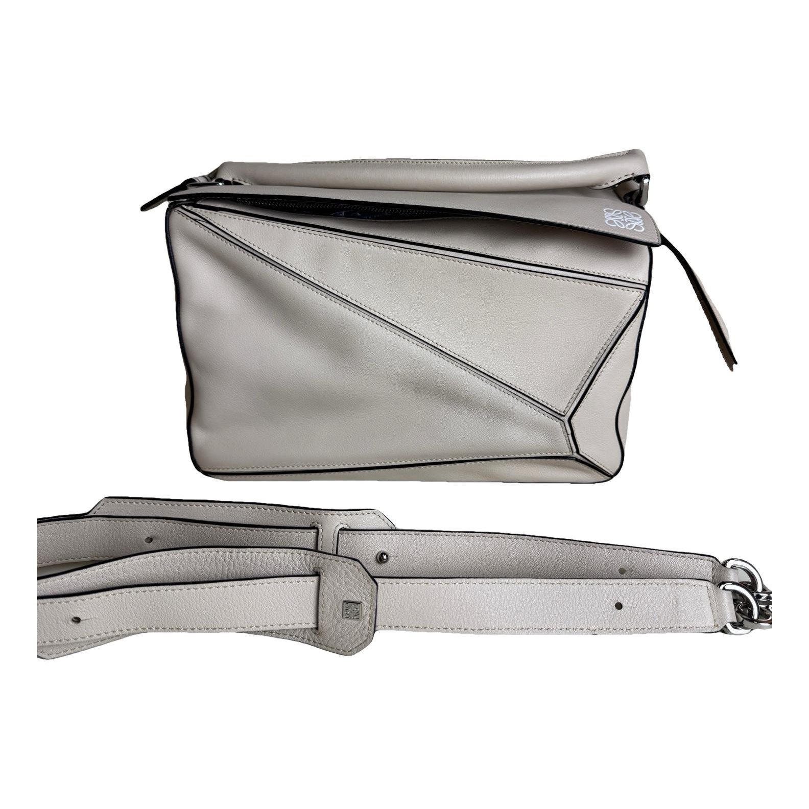 Puzzle leather handbag