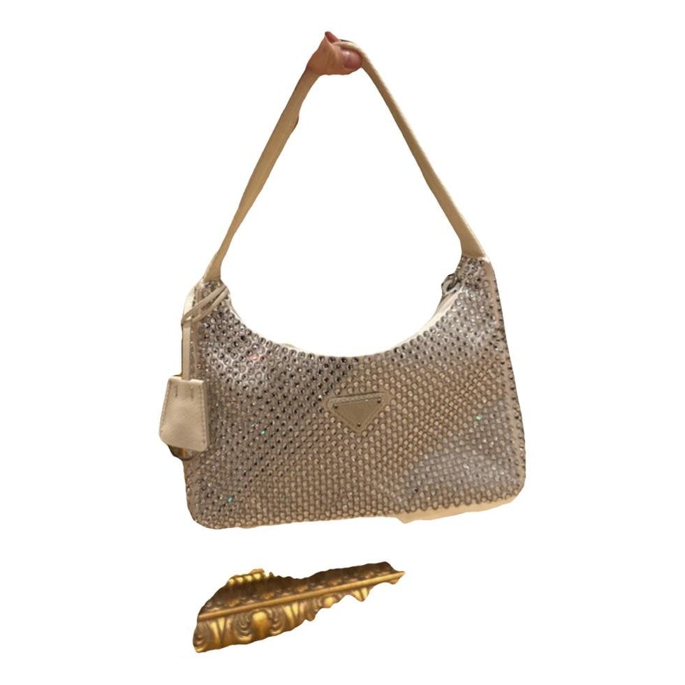 Re-edition clutch bag
