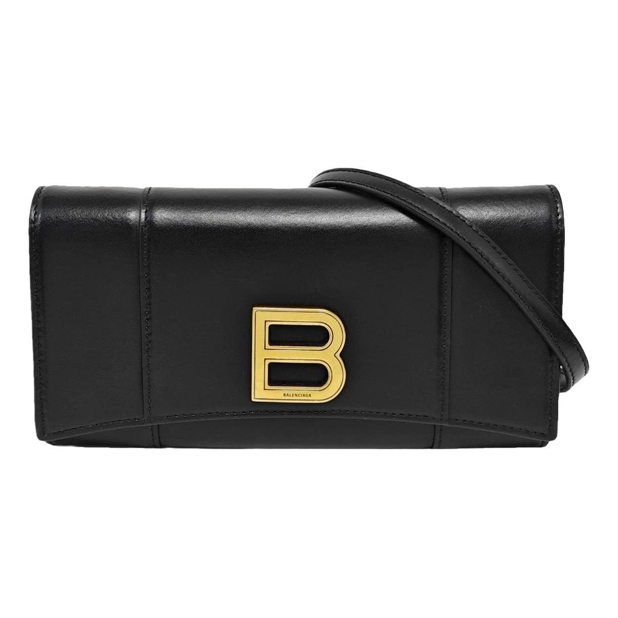 Hourglass leather handbag