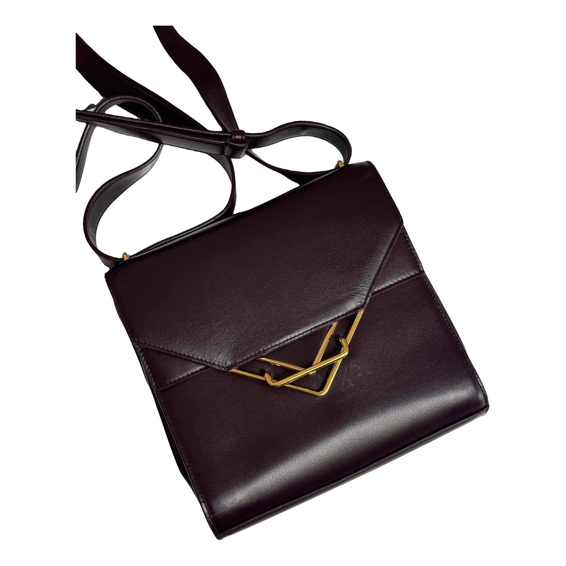 Clip leather crossbody bag