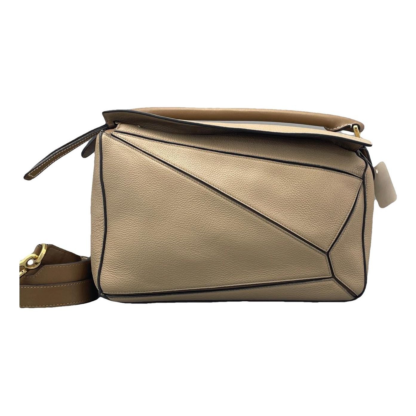 Puzzle leather handbag