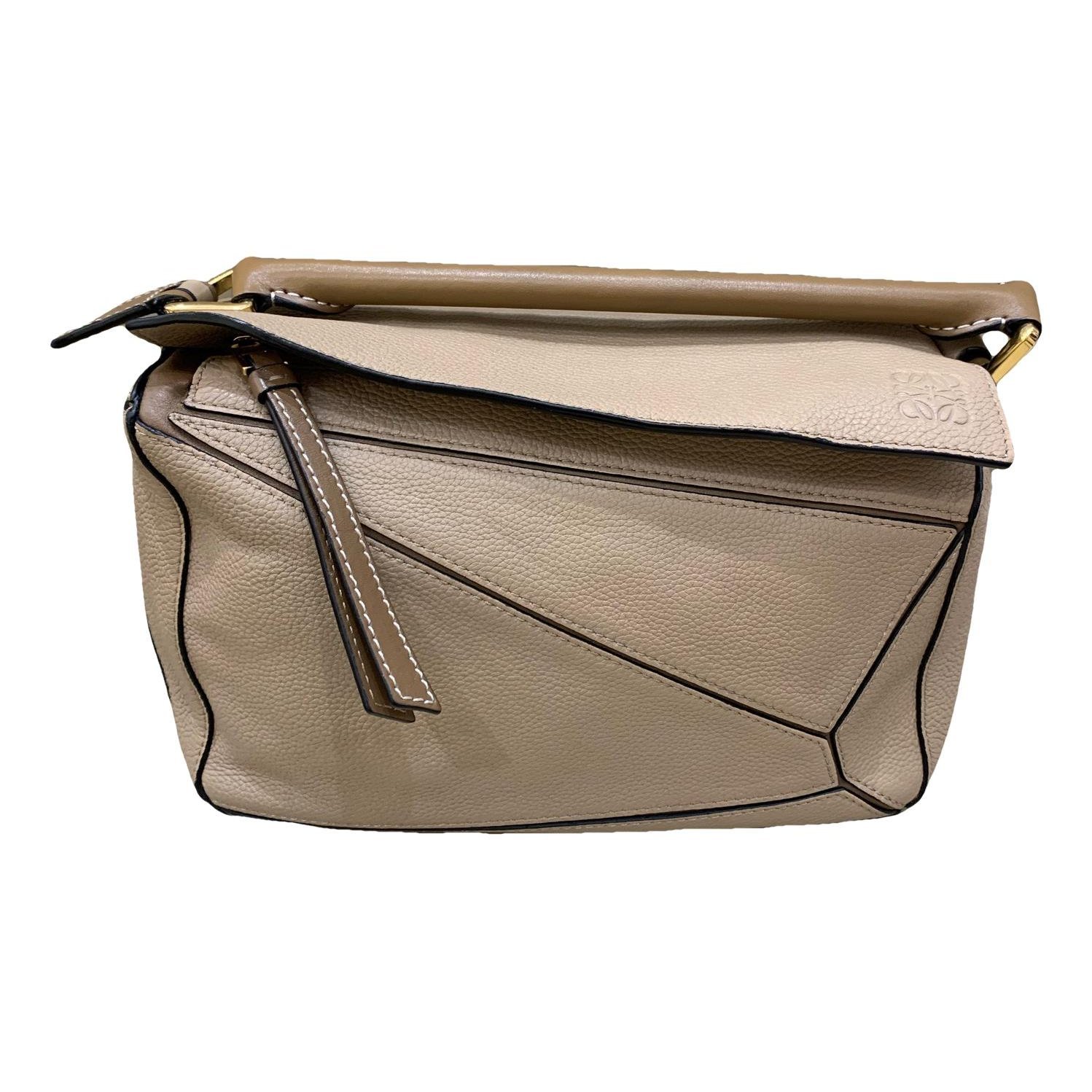 Puzzle leather handbag