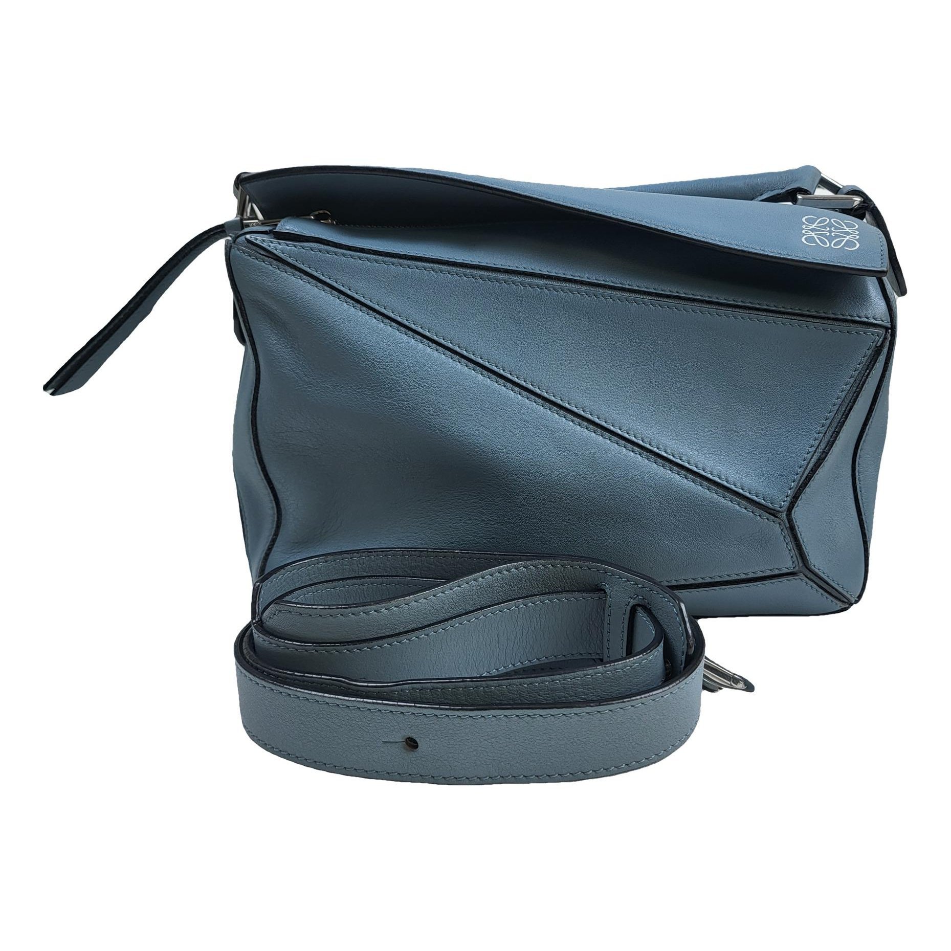 Puzzle leather handbag