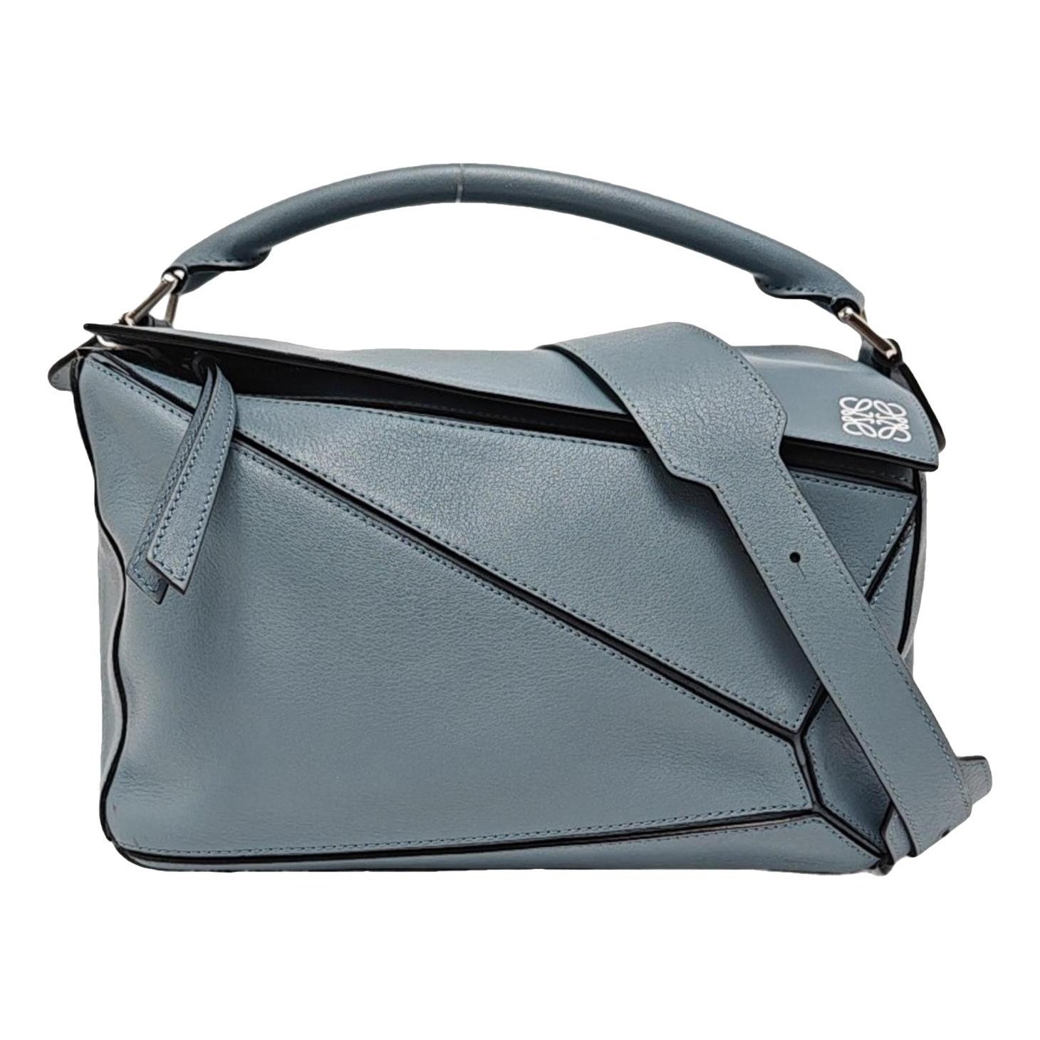 Puzzle leather handbag