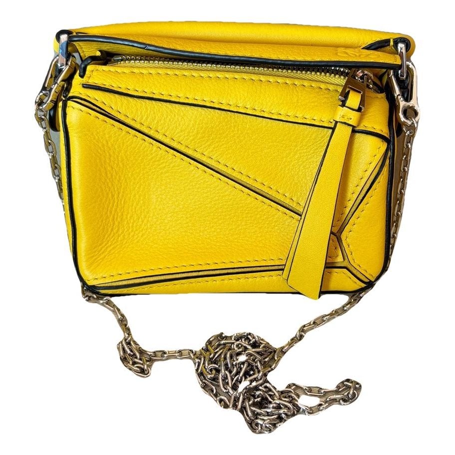 Puzzle leather handbag