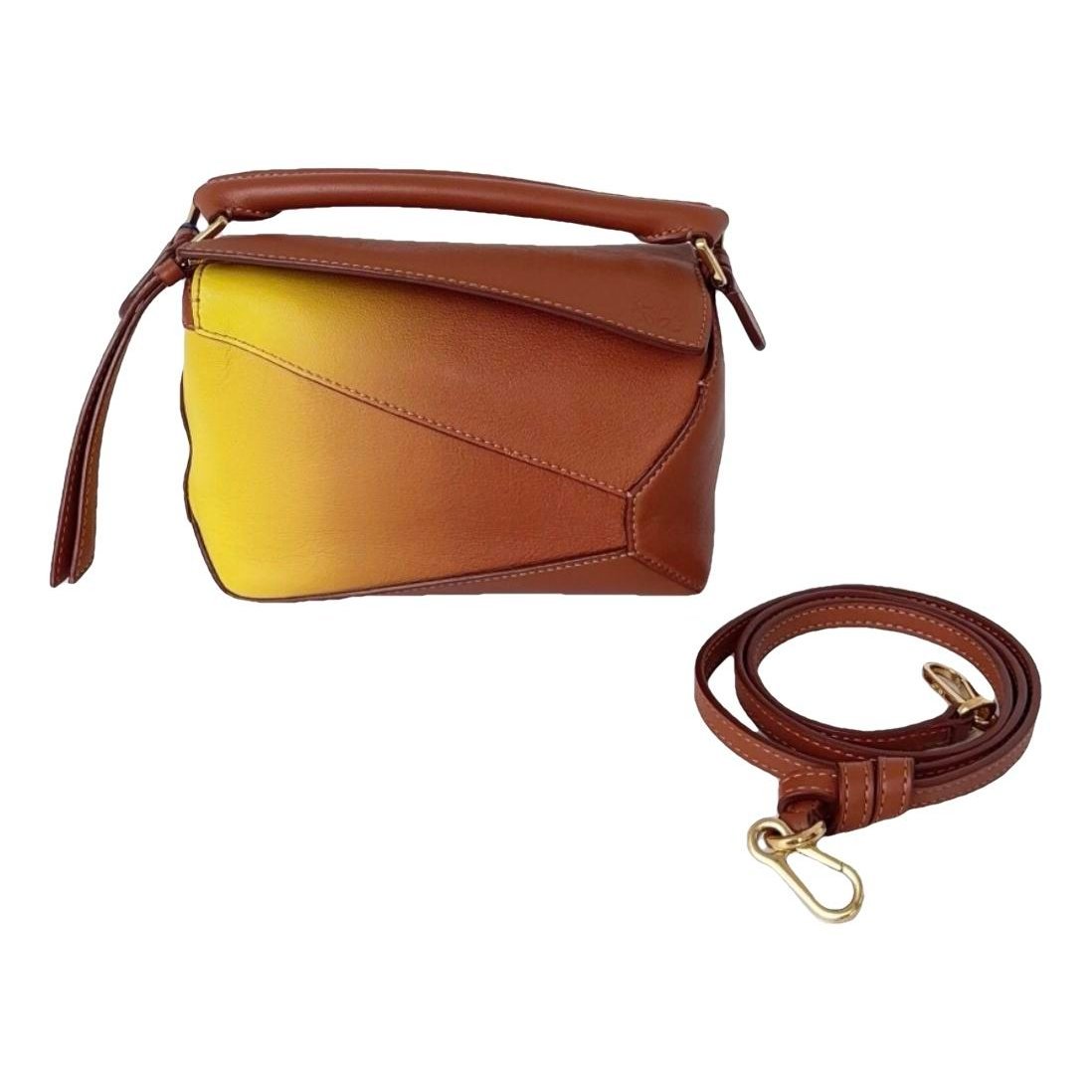 Puzzle leather handbag