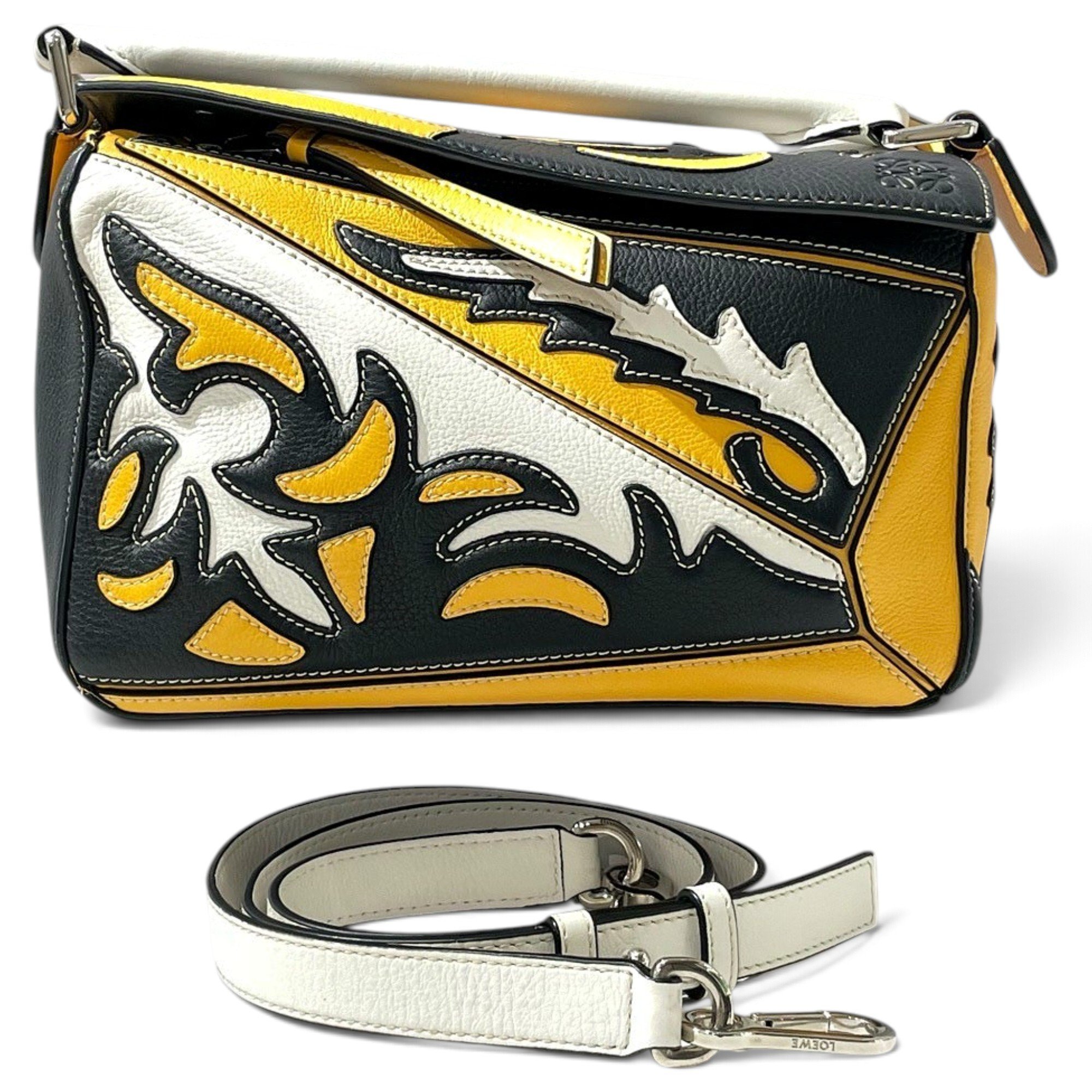 Puzzle leather handbag