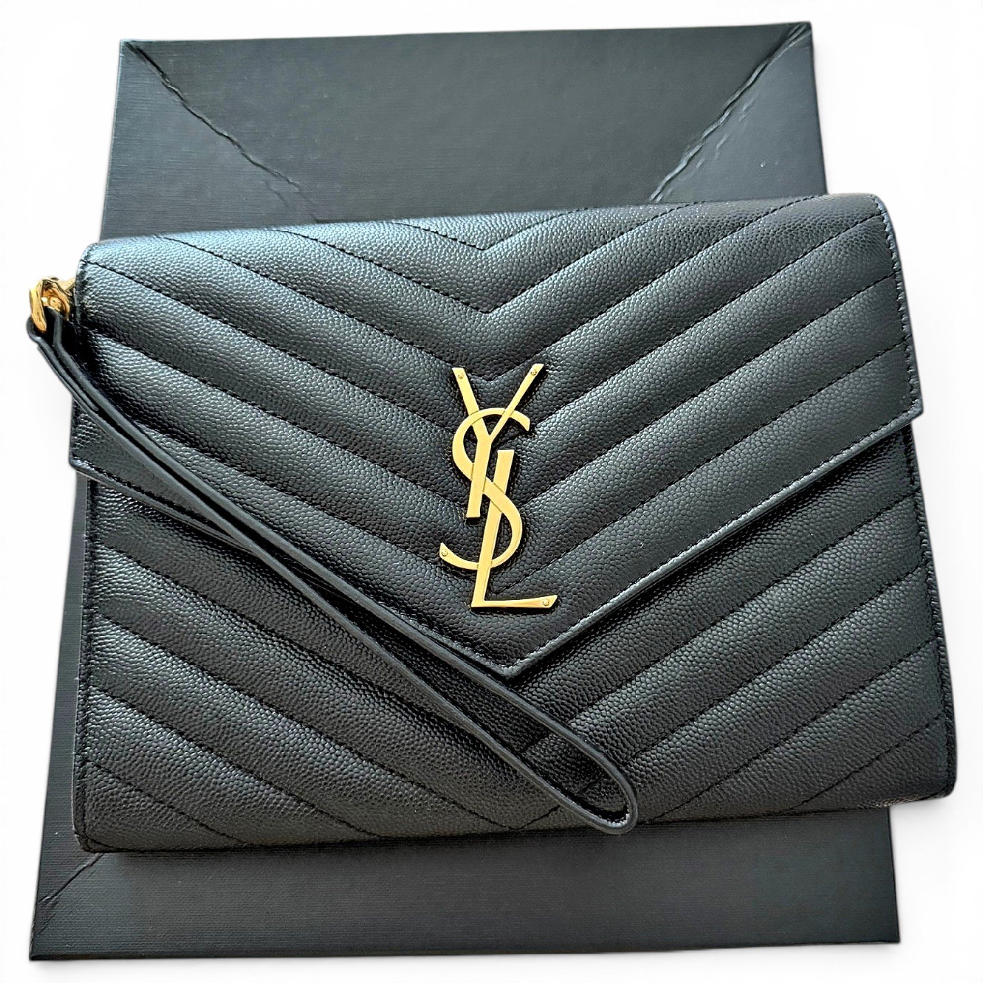Cassandre leather clutch bag
