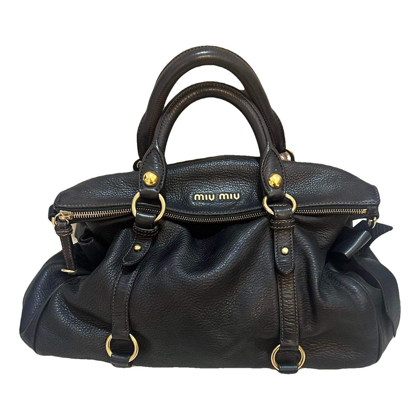 Bow bag leather handbag