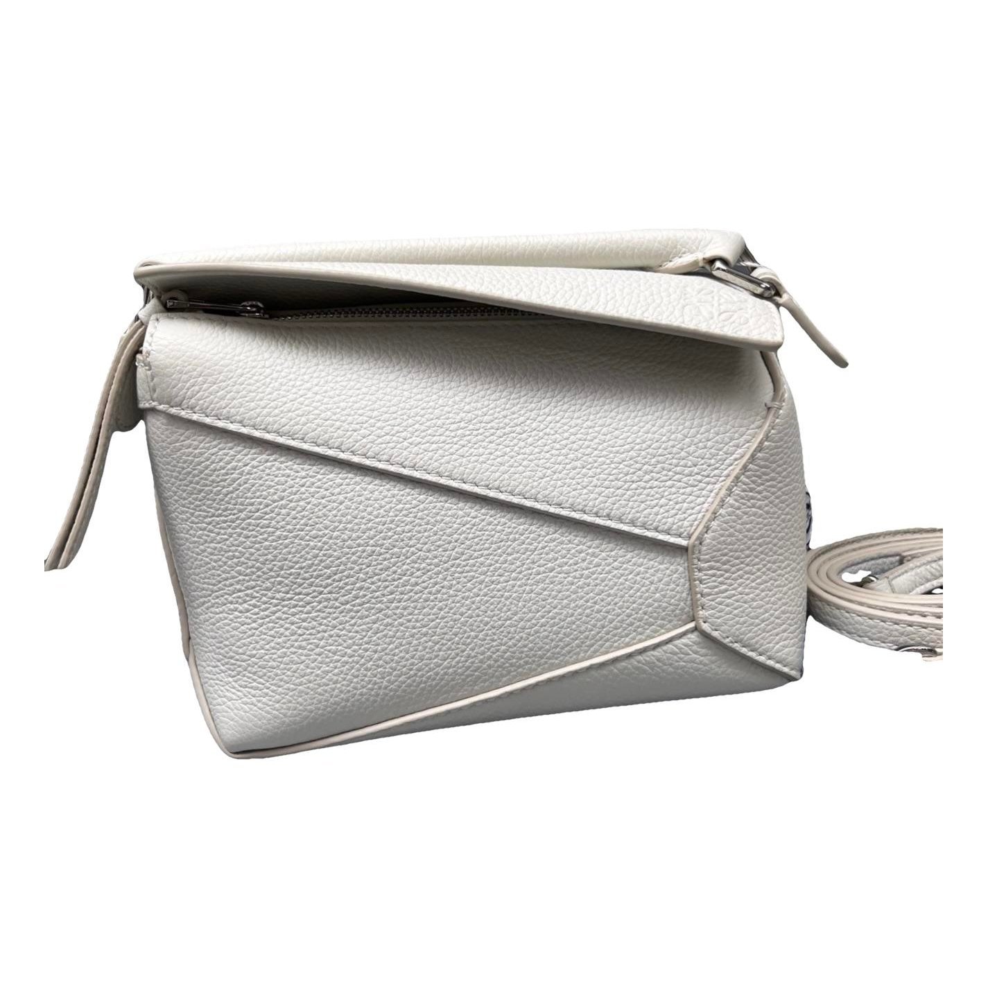 Puzzle leather handbag