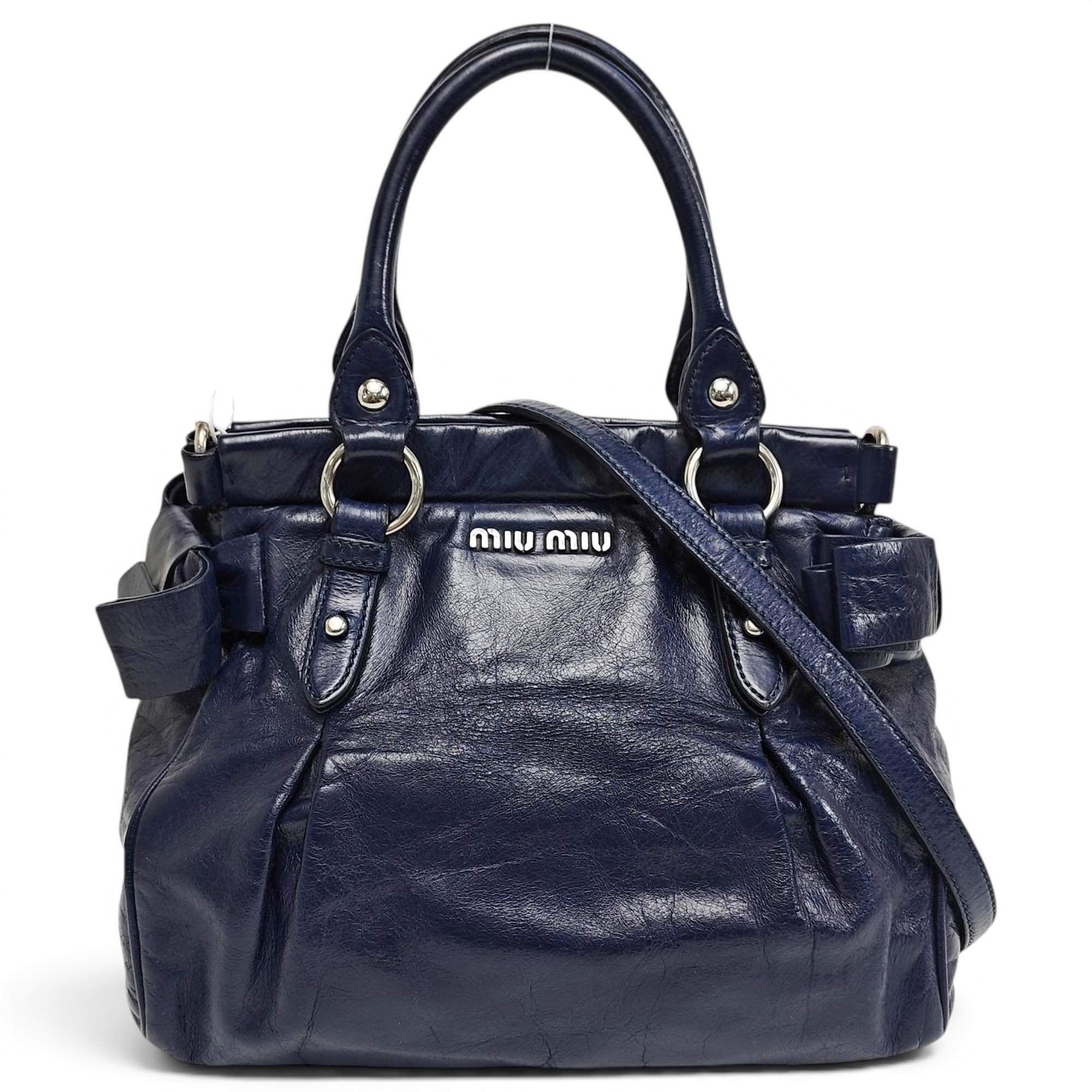 Bow bag leather handbag