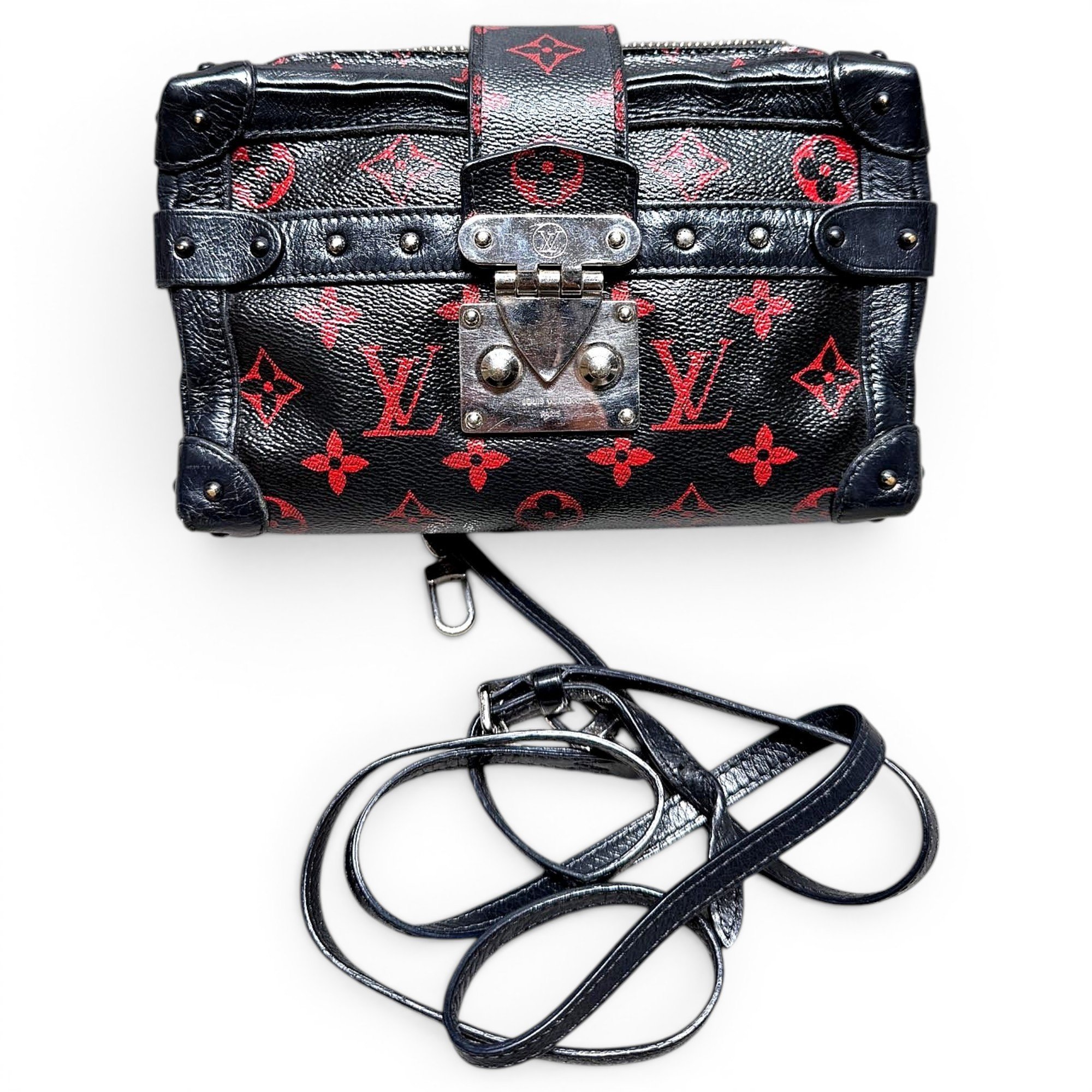 Pochette Trunk leather handbag