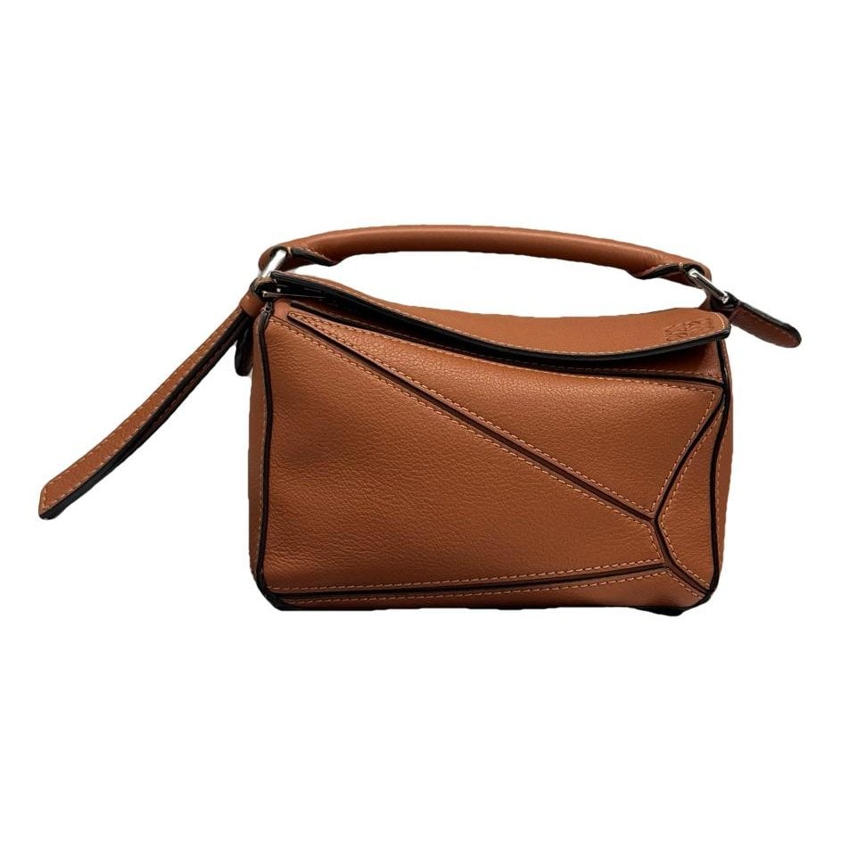 Puzzle leather handbag