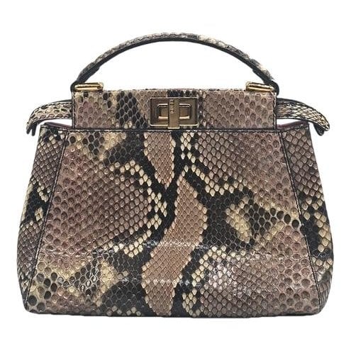 Peekaboo python handbag