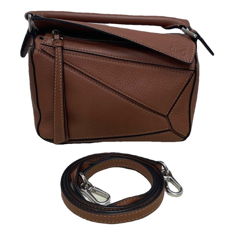 Puzzle leather handbag