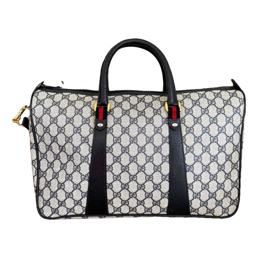 Ophidia Boston patent leather handbag