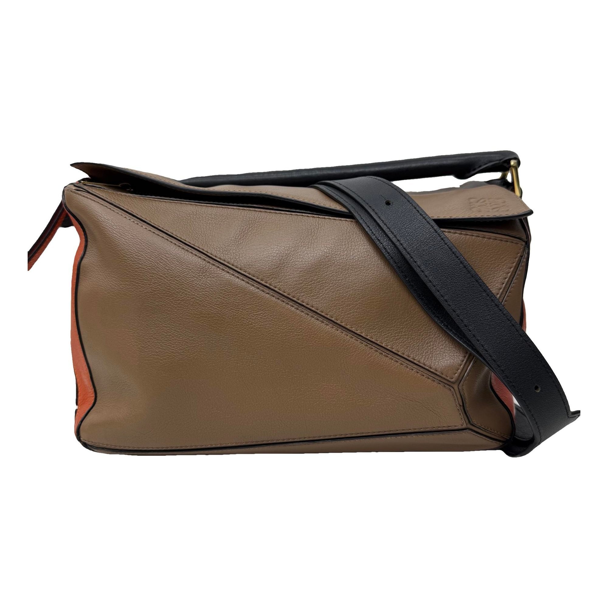 Puzzle leather handbag