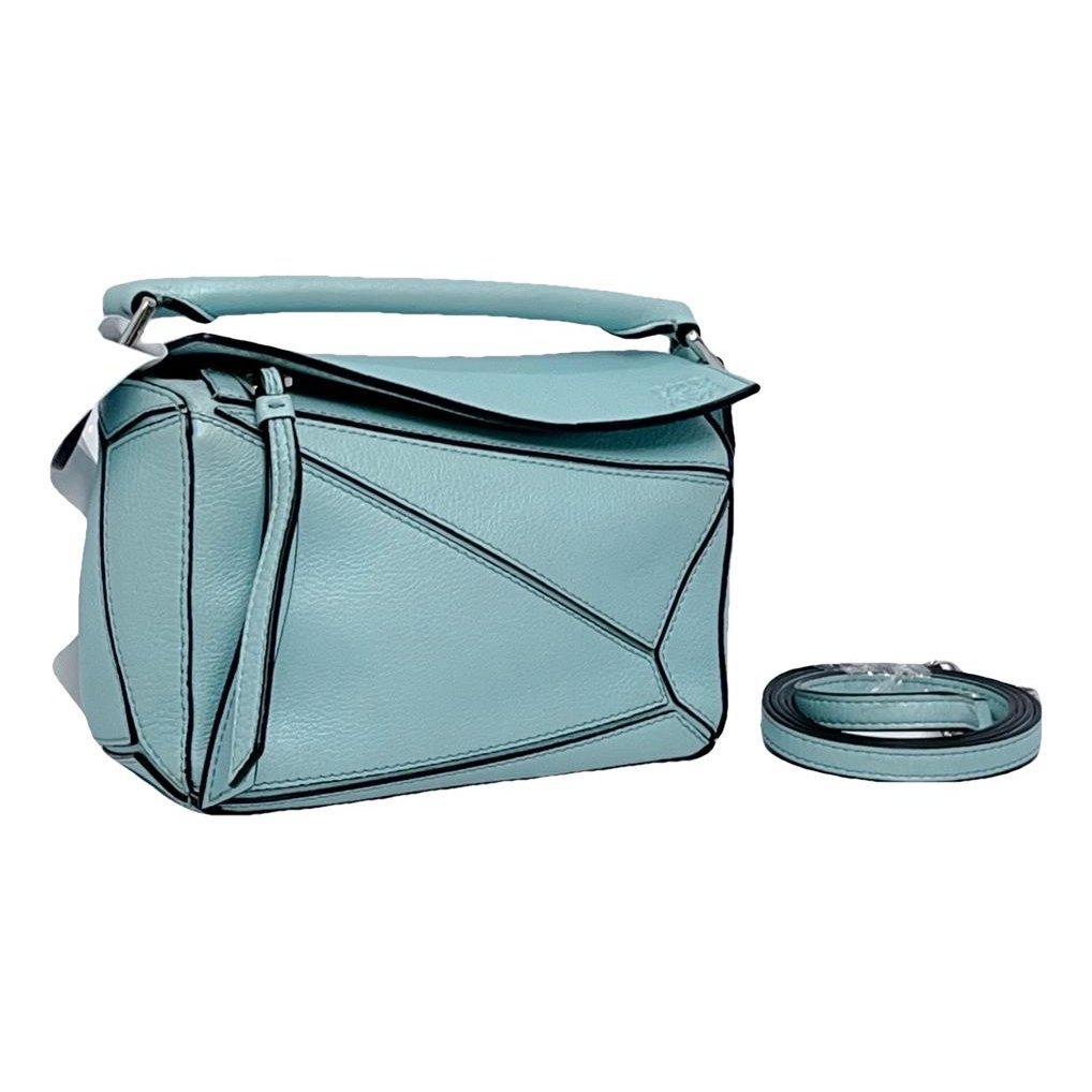 Puzzle leather handbag
