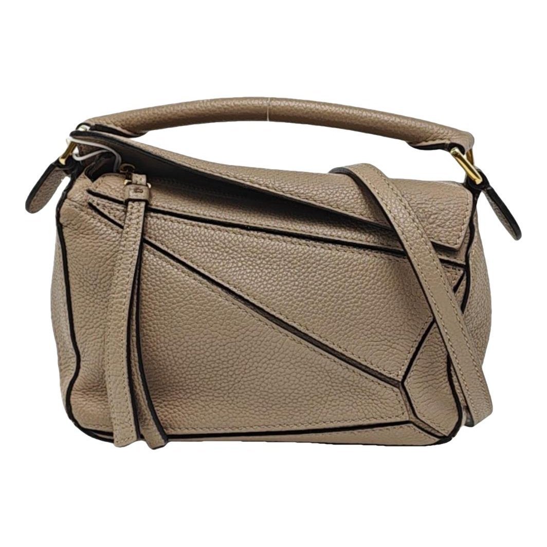 Puzzle leather handbag
