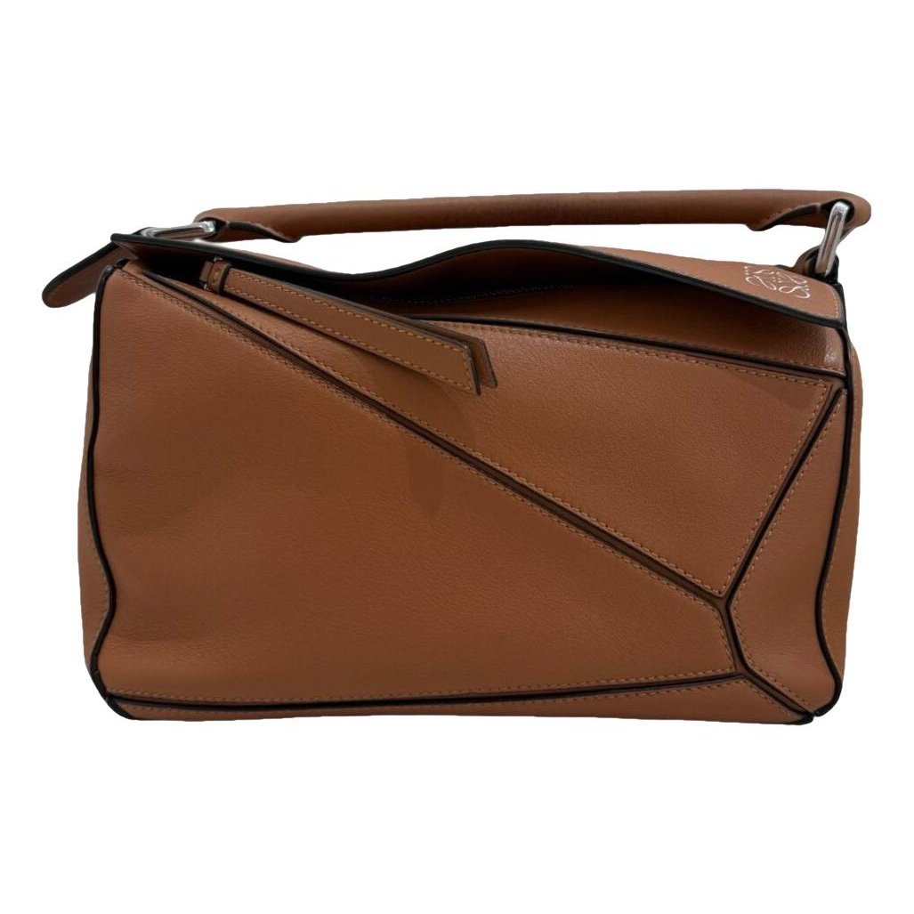 Puzzle leather handbag
