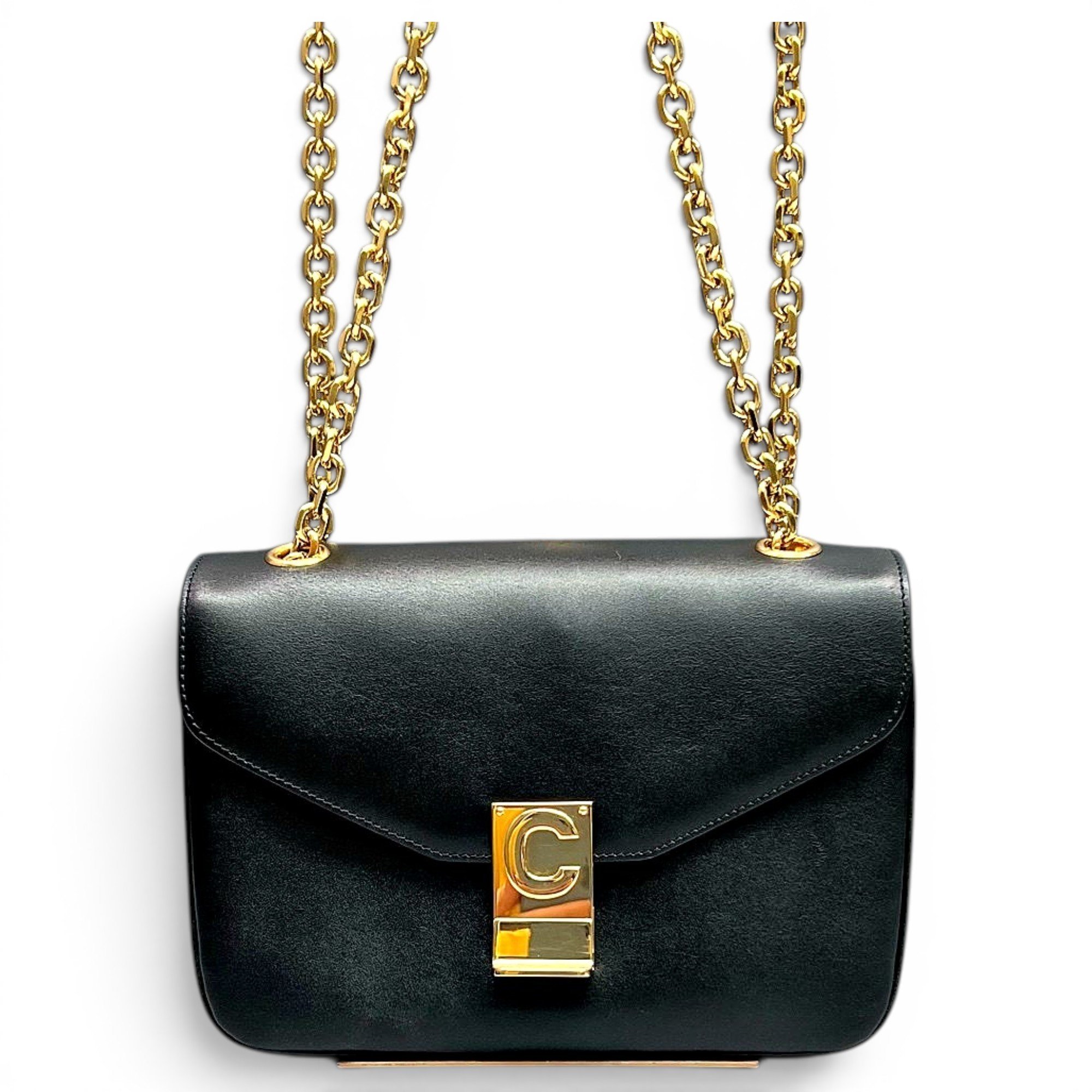Clasp leather handbag