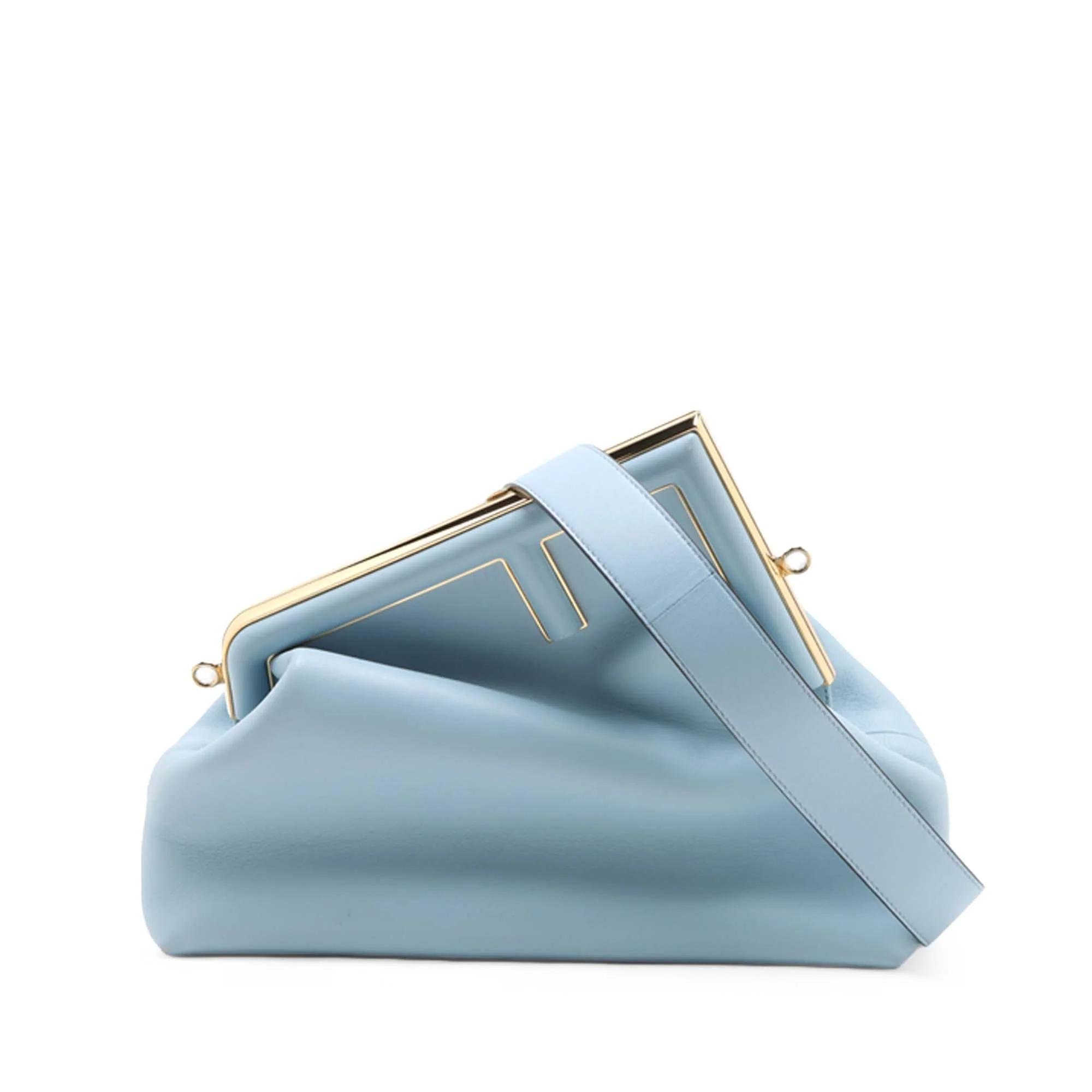 First leather handbag