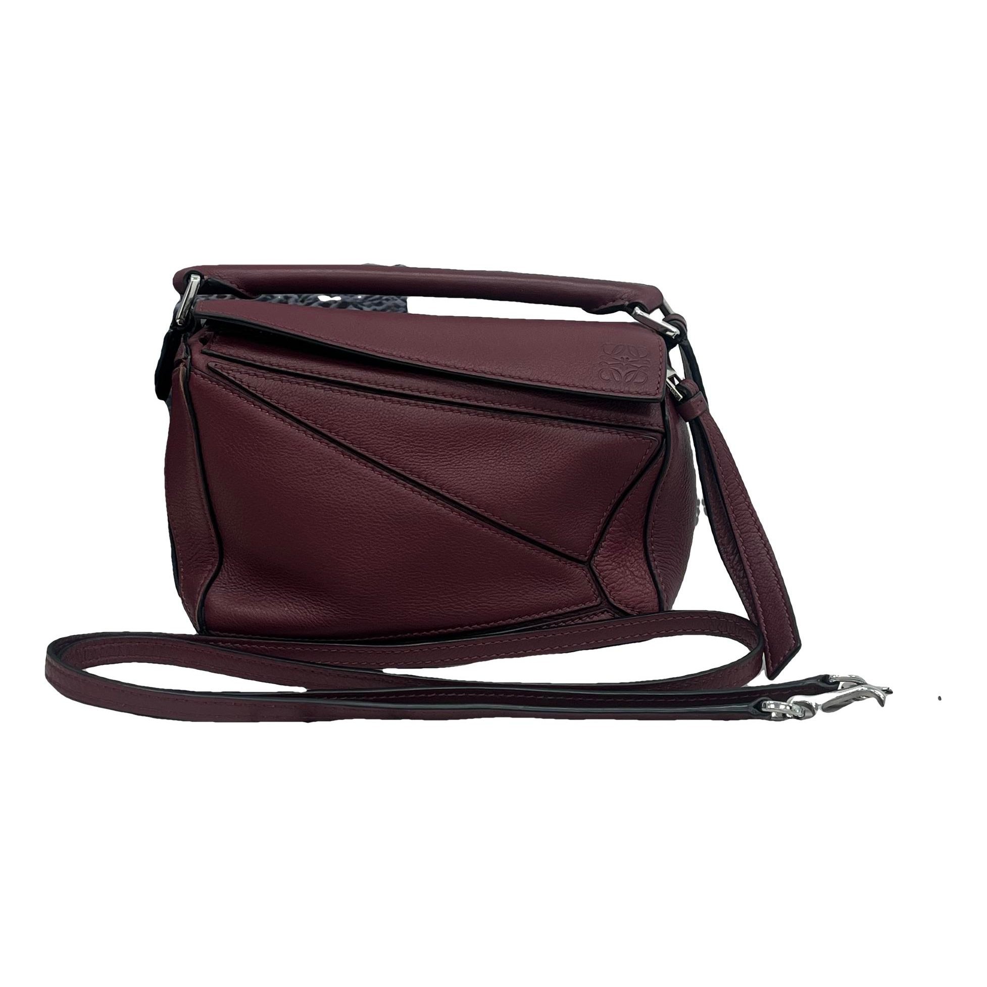 Puzzle leather handbag