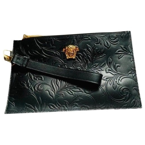 La Medusa leather clutch bag