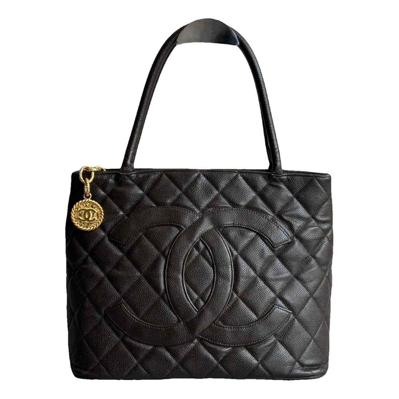 Médaillon leather handbag
