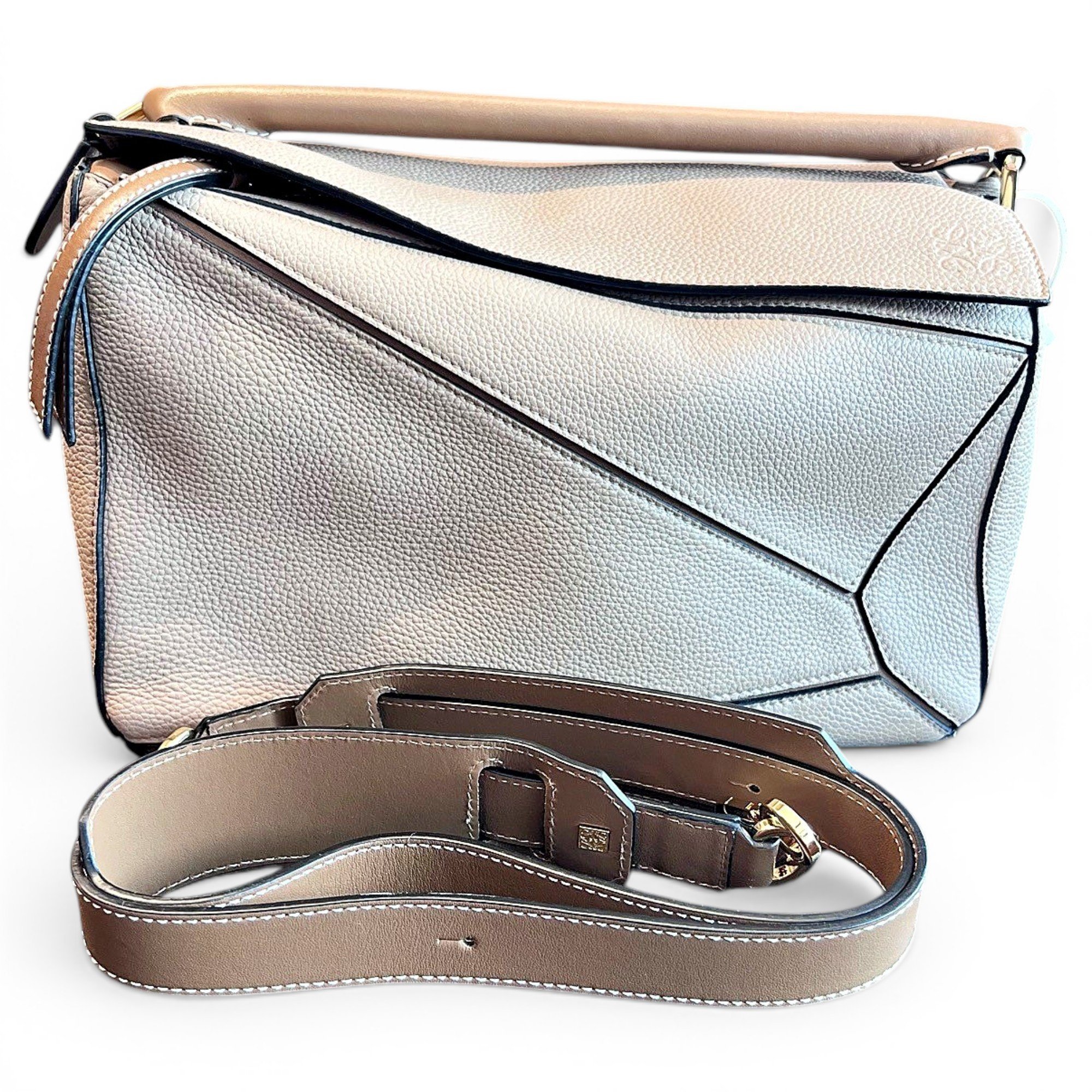 Puzzle leather handbag