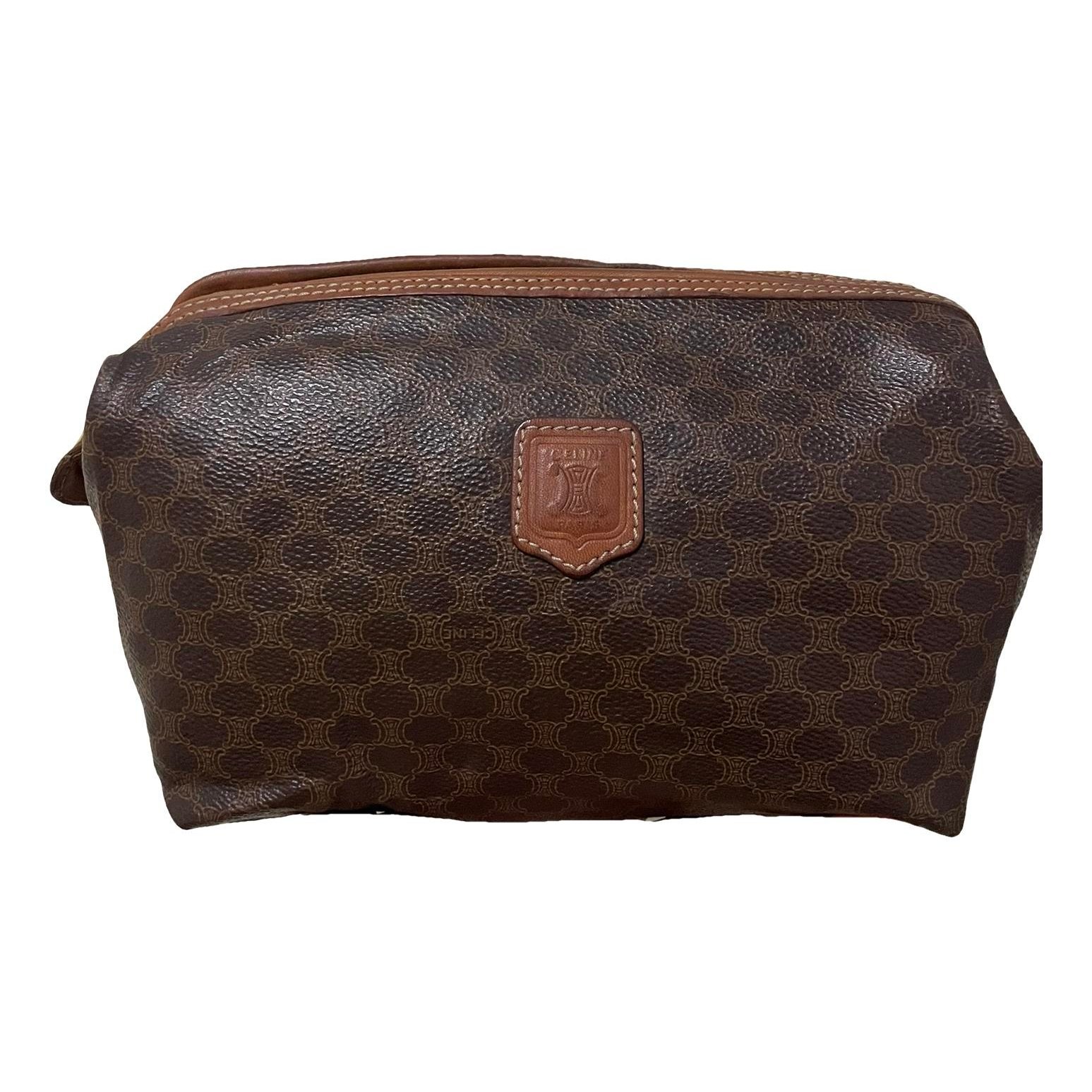 Triomphe Vintage leather clutch bag