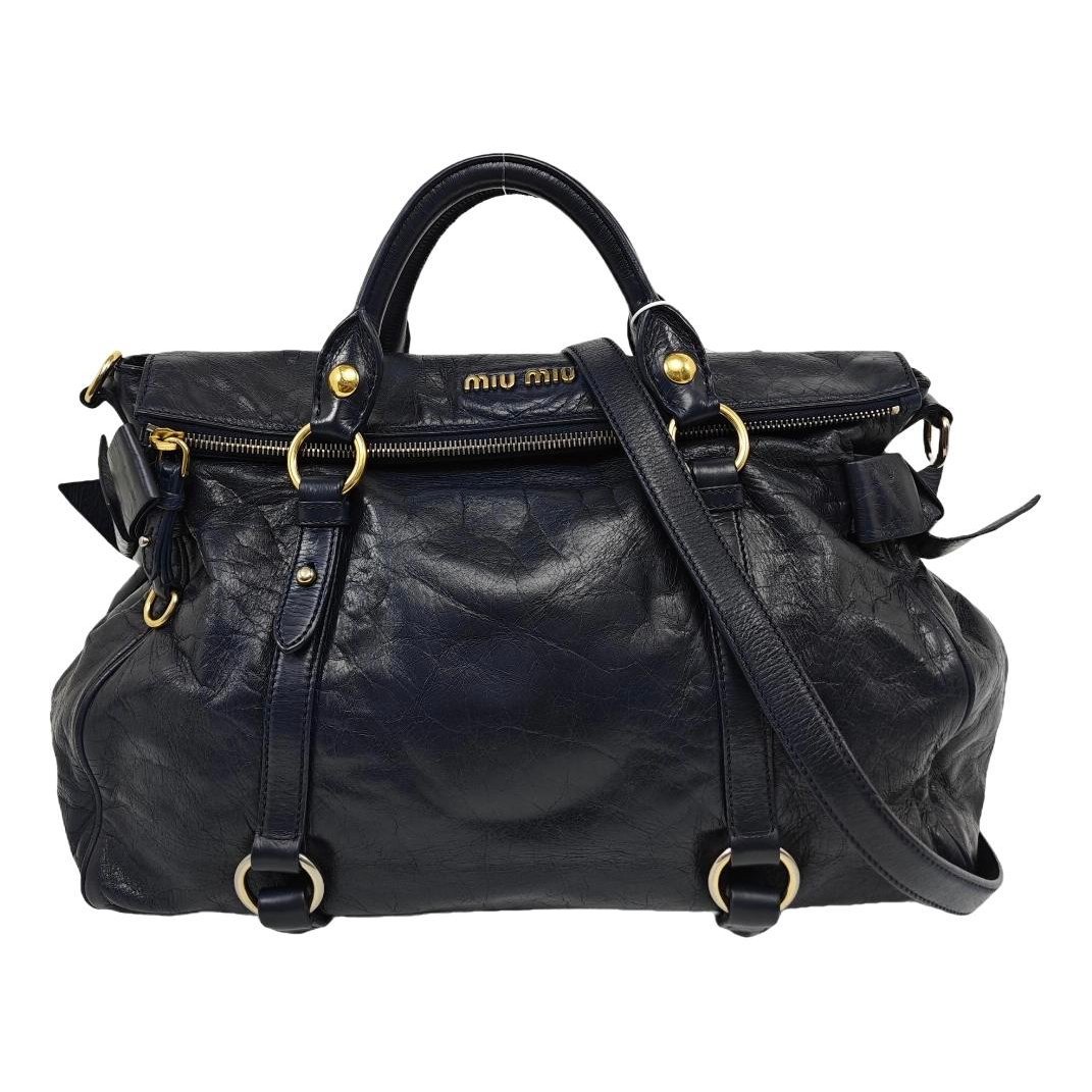 Bow bag leather handbag