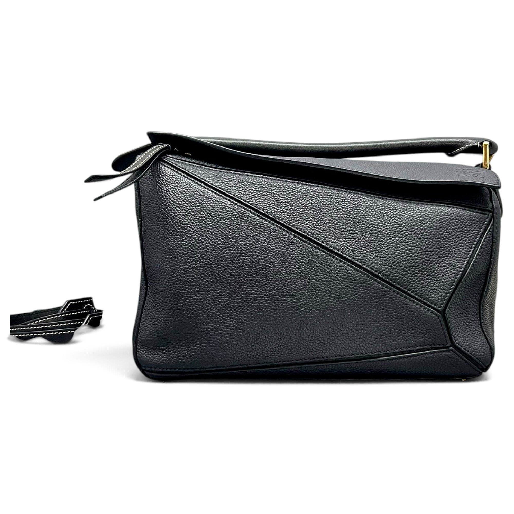 Puzzle leather handbag