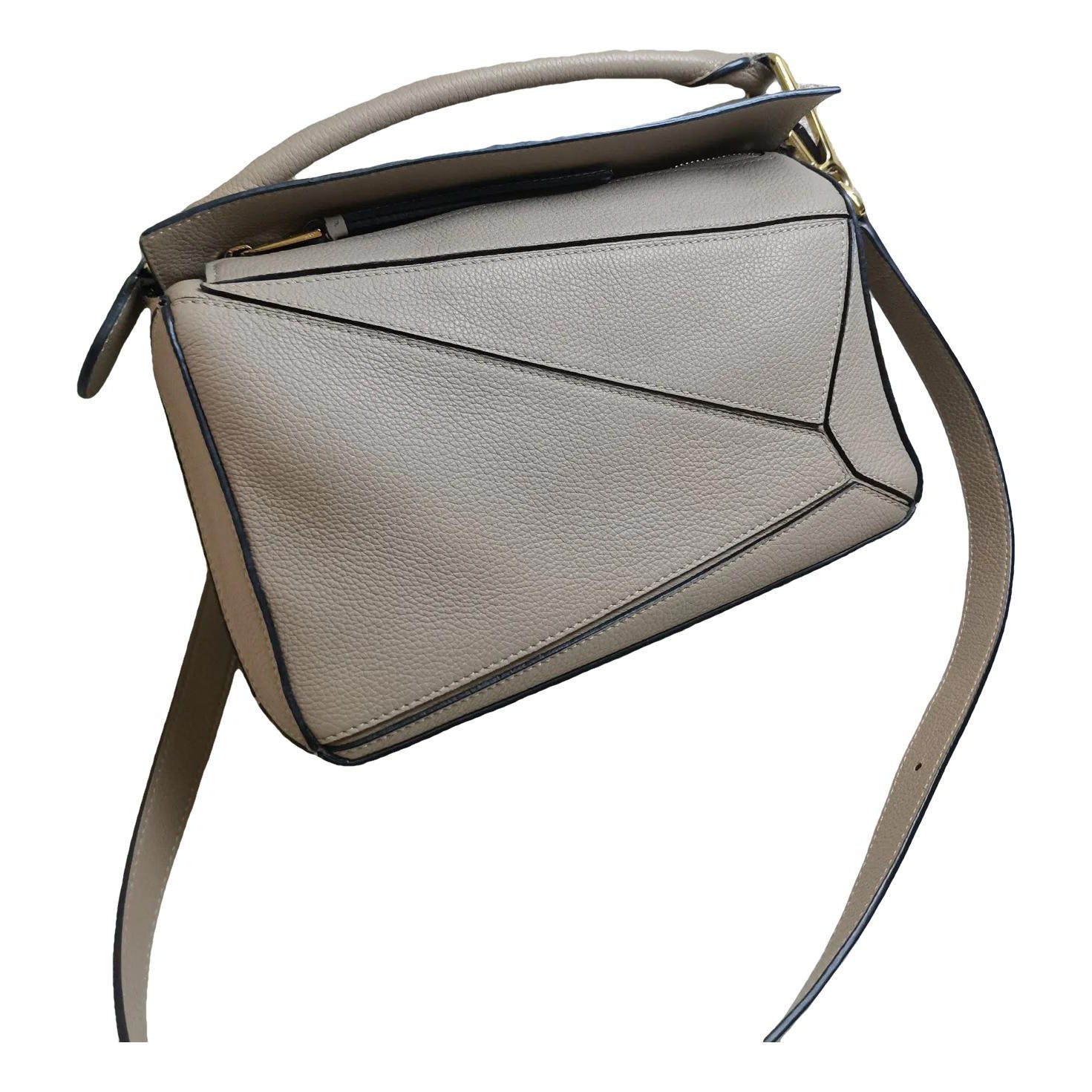 Puzzle leather crossbody bag