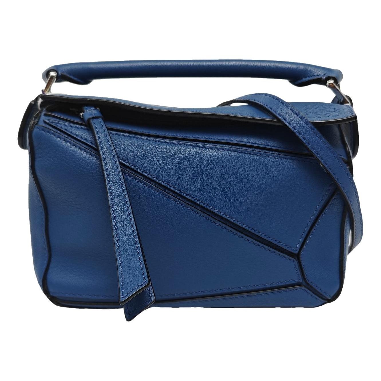 Puzzle leather crossbody bag
