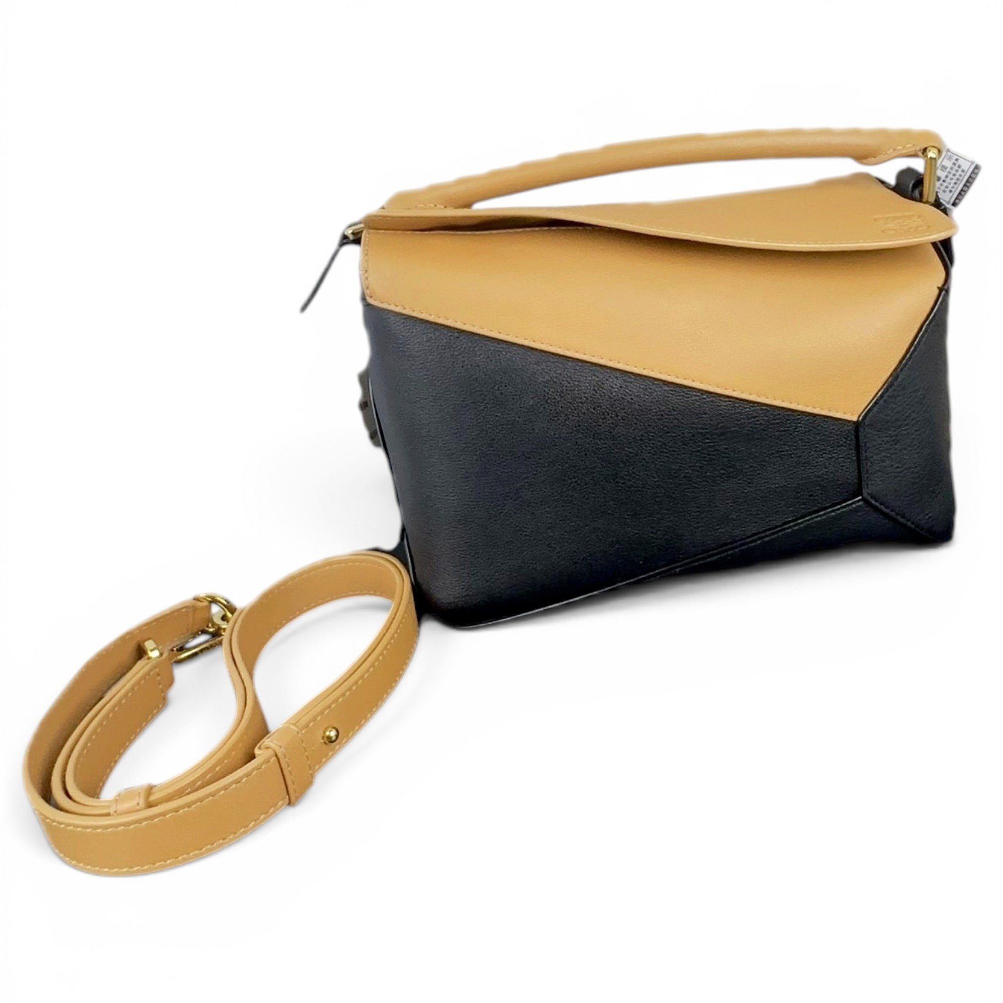 Puzzle leather handbag