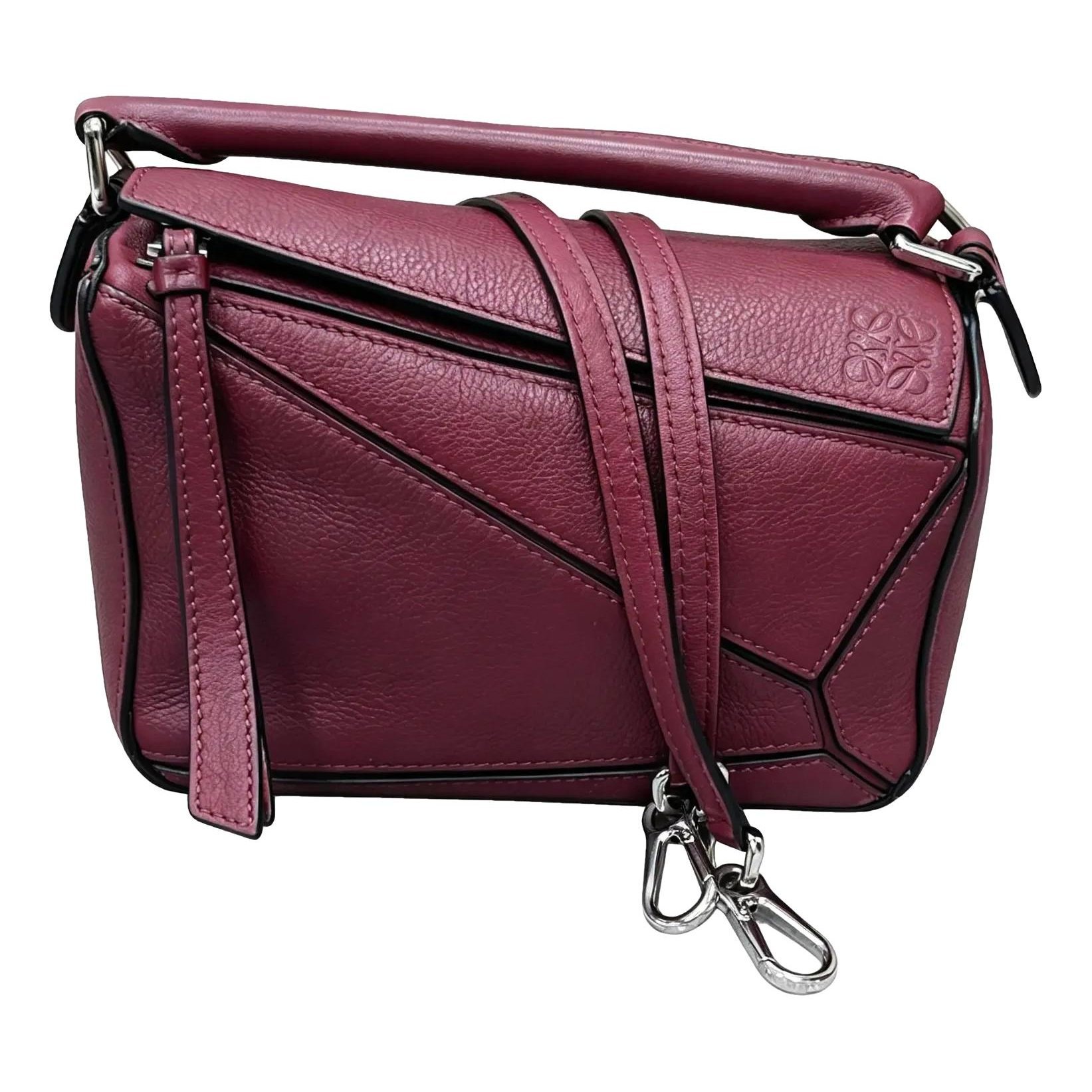 Puzzle leather handbag