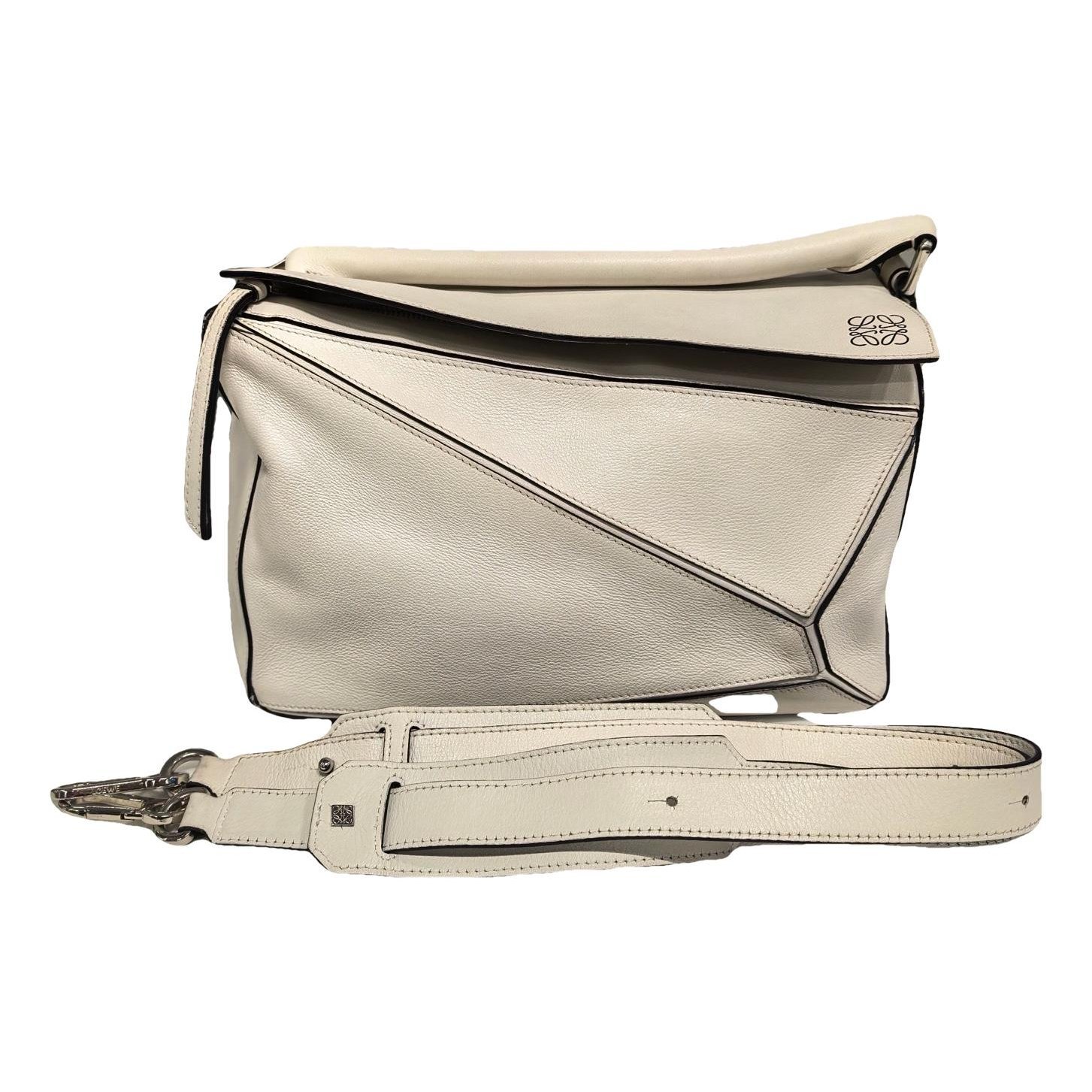 Puzzle leather handbag