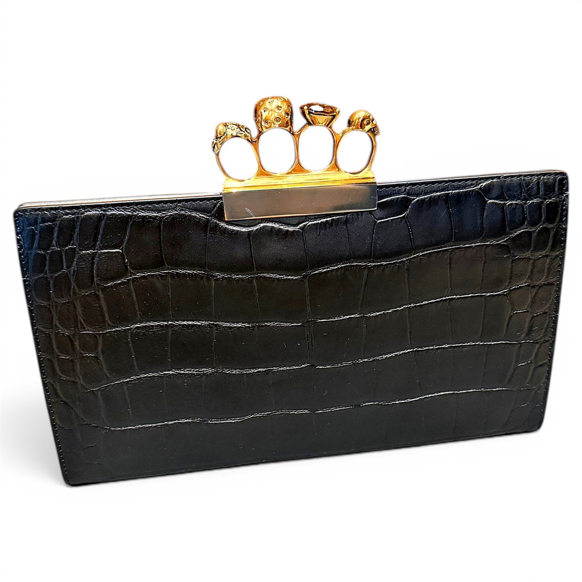 Knuckle leather clutch bag