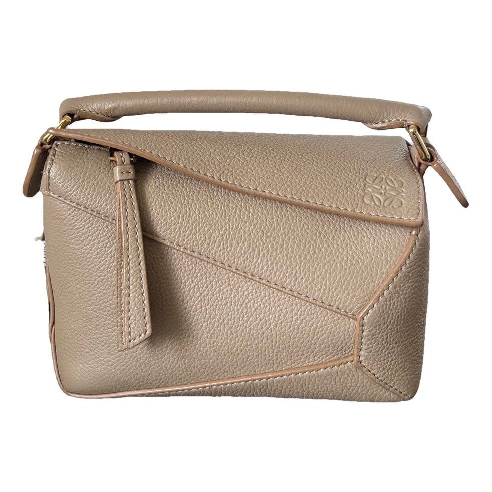 Puzzle leather handbag