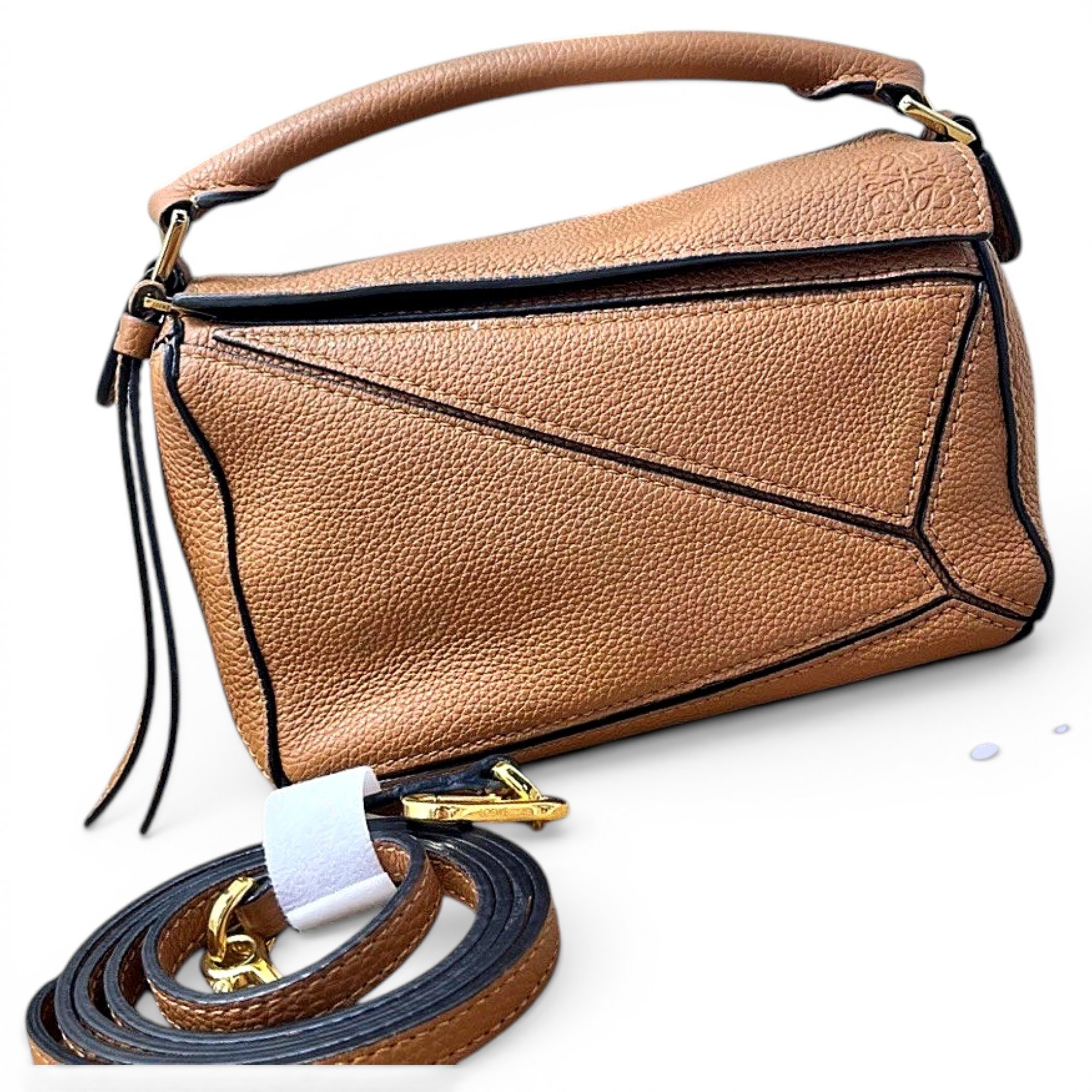 Puzzle leather handbag