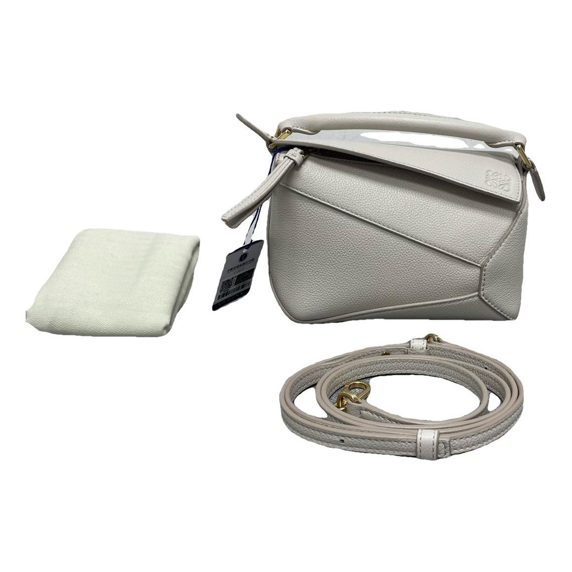 Puzzle leather handbag