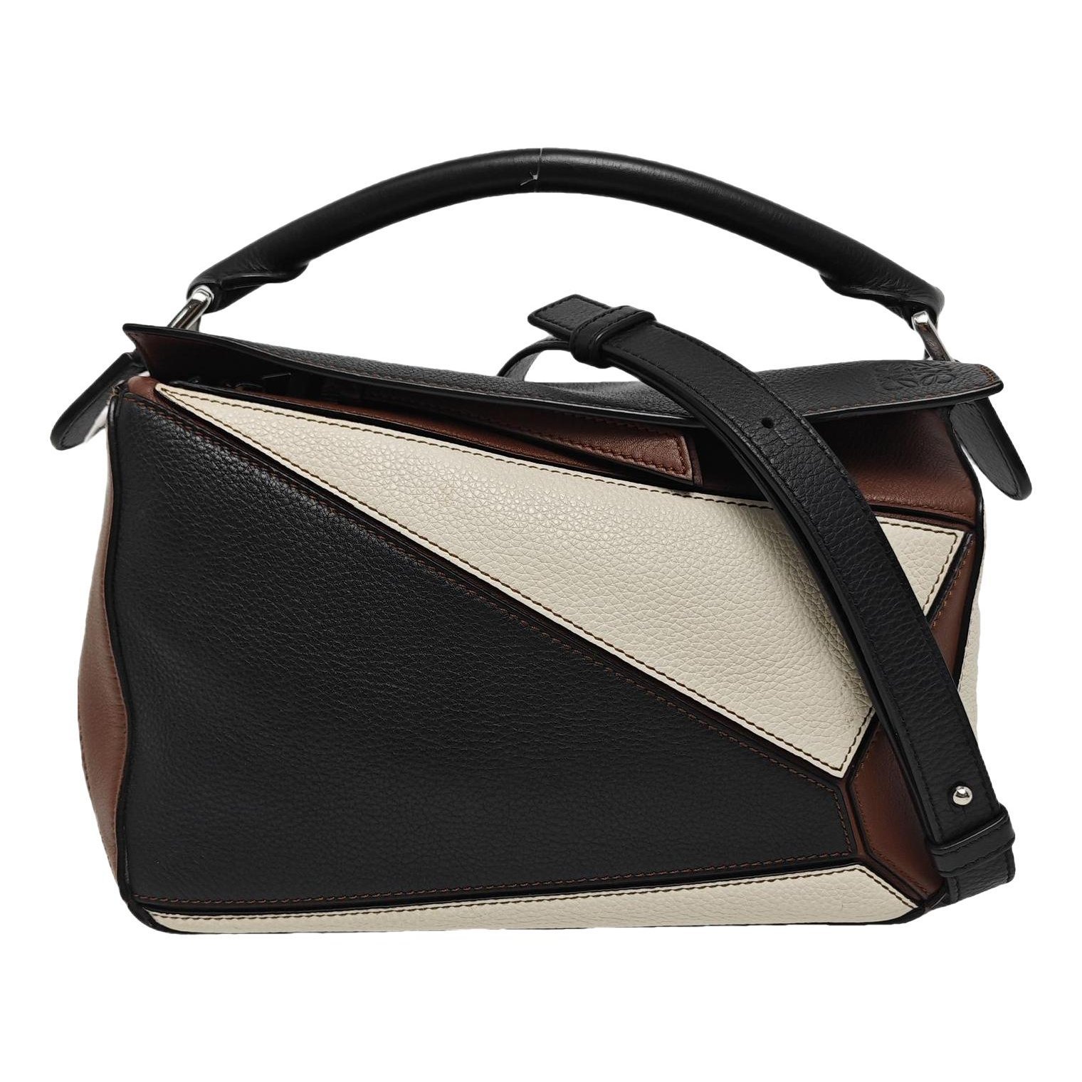 Puzzle leather handbag
