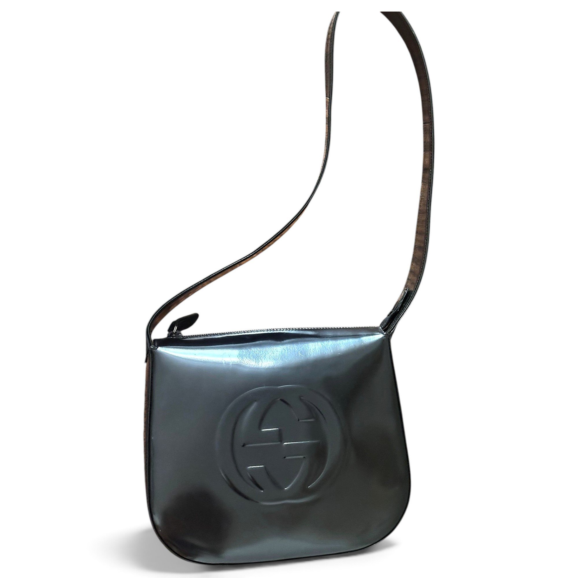 Interlocking patent leather handbag