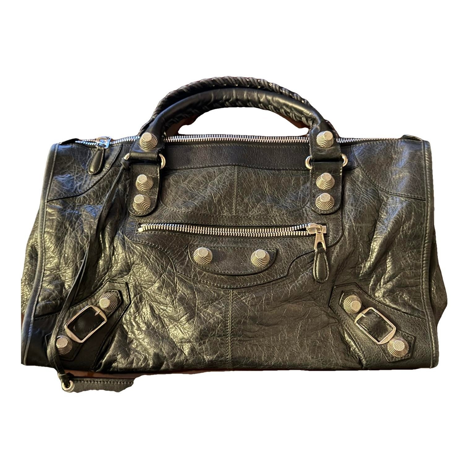 First leather handbag