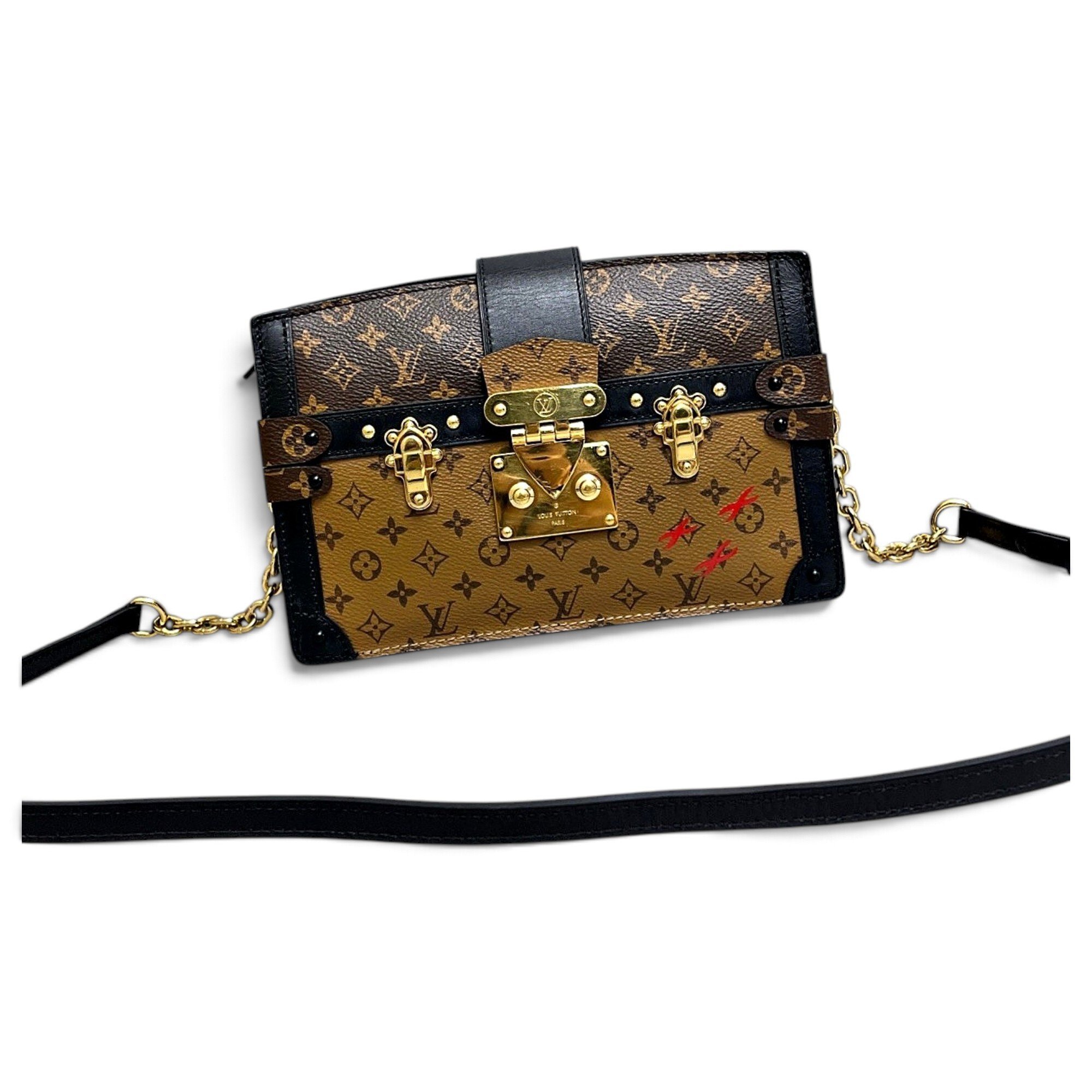 Pochette Trunk leather handbag