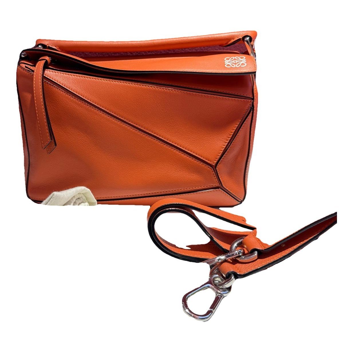 Puzzle leather handbag